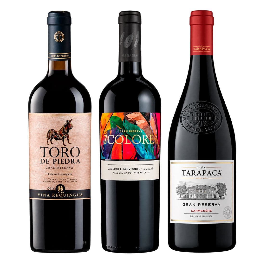 PACK TINTOS TRIO ATÓMICO: Vino Toro de Piedra Cabernet Sauvignon 750cc + Vino 7 Colores Gran Reserva Carmenere 750cc + Vino Tarapacá Gran Reserva Carmenere 750cc_1